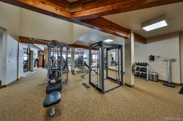 exercise room with baseboards