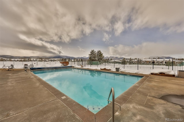 view of pool featuring a fenced in pool, a patio area, and fence