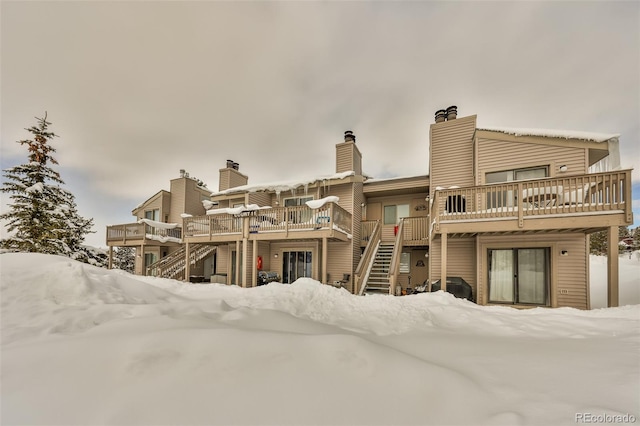 exterior space featuring stairway and a deck