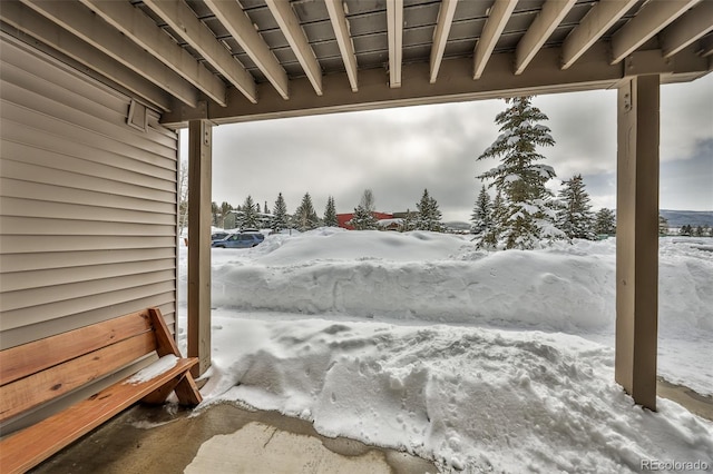 view of snow covered patio