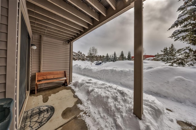 view of snow covered patio