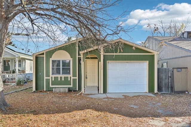 ranch-style home featuring a garage