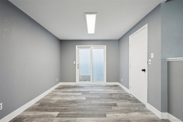 empty room featuring light hardwood / wood-style floors