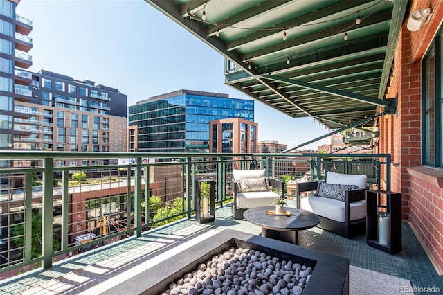 1735 19th St Unit 6D, Denver, CO 80202 - balcony featuring a view of city and an outdoor hangout area