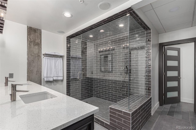 1735 19th St Unit 6D, Denver, CO 80202 - full bath with double vanity, a shower stall, and recessed lighting