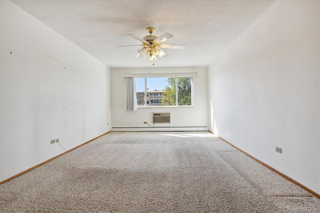 carpeted empty room featuring a textured ceiling and ceiling fan