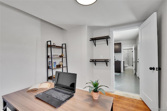 office space with light wood-style floors