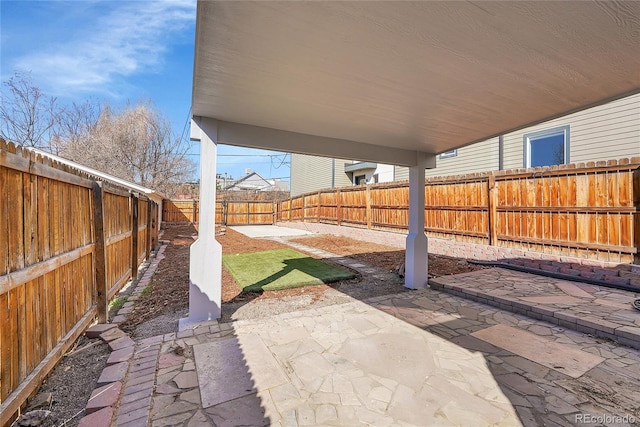 view of patio with a fenced backyard