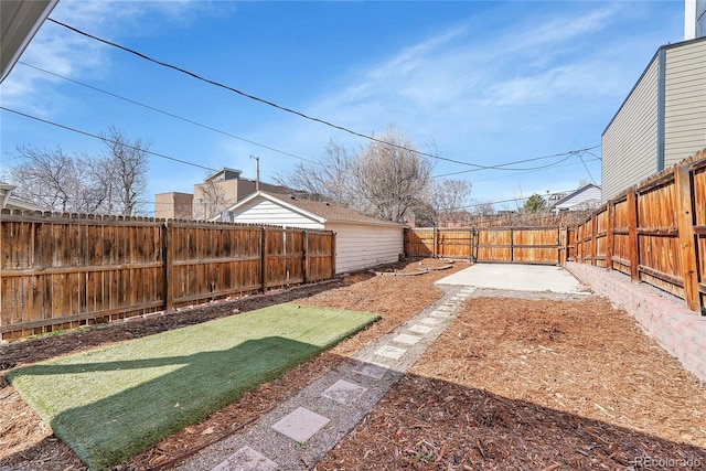 view of yard featuring a fenced backyard