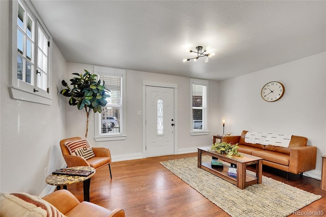 living room with wood finished floors and baseboards