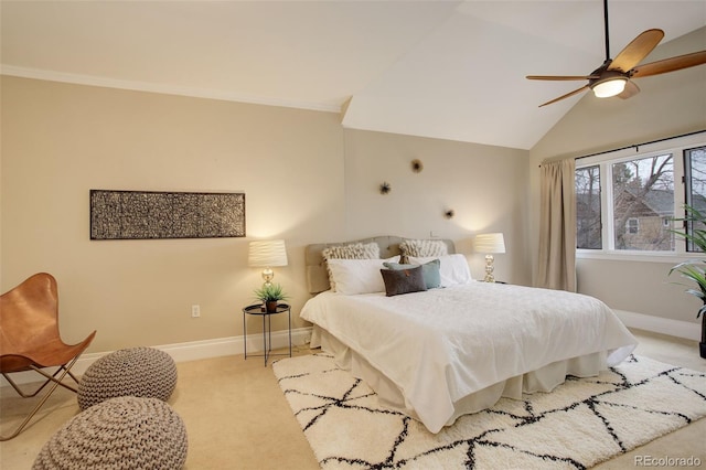 bedroom with baseboards, light colored carpet, ceiling fan, ornamental molding, and vaulted ceiling