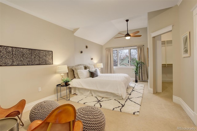 bedroom featuring a spacious closet, a closet, carpet, and baseboards