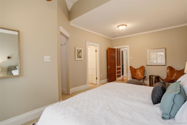 bedroom featuring baseboards and crown molding