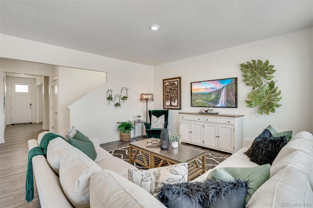 living room with light hardwood / wood-style floors