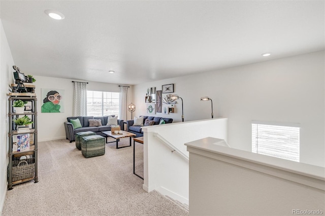 living room featuring light colored carpet