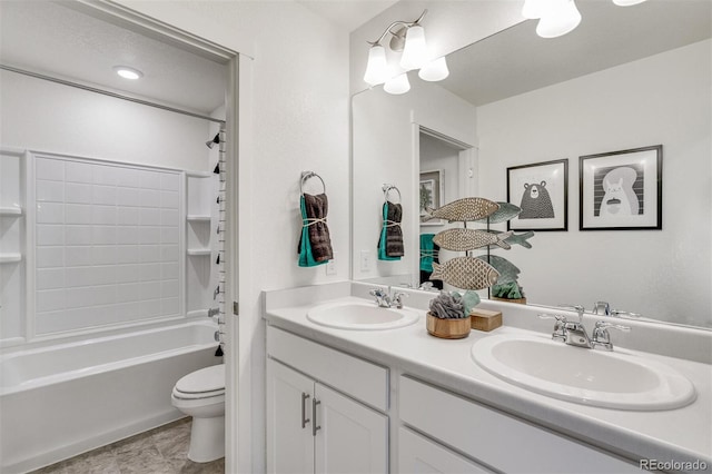 full bathroom featuring vanity, toilet, and shower / bath combination