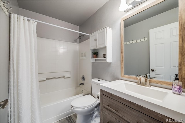 full bath with shower / bath combination with curtain, a textured wall, vanity, and toilet