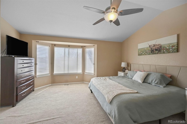 1386 Avgare Way, Erie, CO 80516 - bedroom with lofted ceiling, light colored carpet, and a ceiling fan