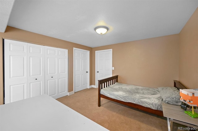1386 Avgare Way, Erie, CO 80516 - bedroom featuring light carpet and a closet