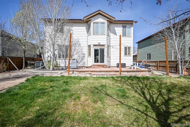 1386 Avgare Way, Erie, CO 80516 - back of house with a fenced backyard and a patio area