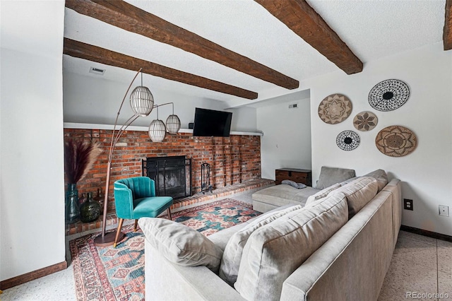 3593 S Gibralter Cir, Aurora, CO 80013 - living room featuring baseboards, a fireplace, beam ceiling, and speckled floor