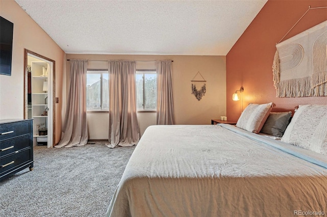 3593 S Gibralter Cir, Aurora, CO 80013 - bedroom with carpet flooring, a textured ceiling, and lofted ceiling