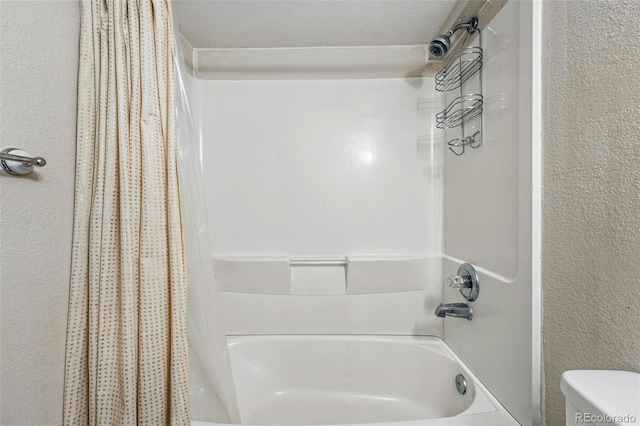 3593 S Gibralter Cir, Aurora, CO 80013 - bathroom with shower / bathtub combination with curtain and toilet