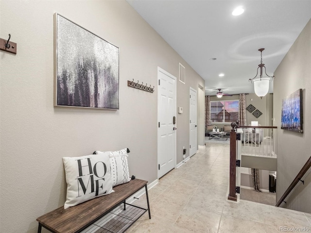 hall featuring visible vents, recessed lighting, an upstairs landing, and baseboards