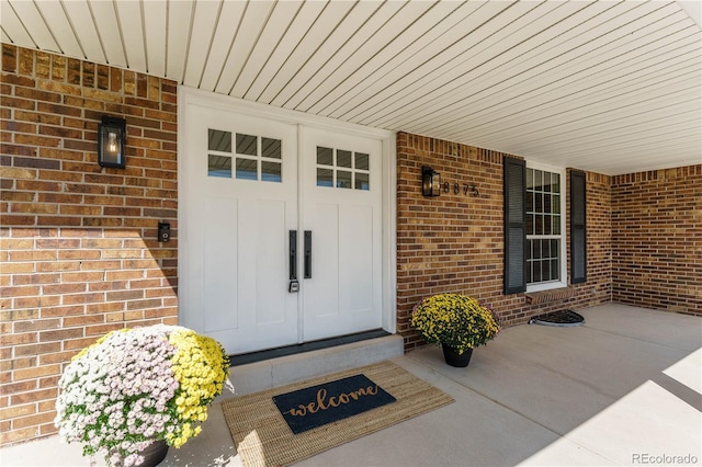 doorway to property with a porch