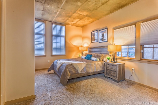 275 S Harrison St Unit 409, Denver, CO 80209 - carpeted bedroom with multiple windows