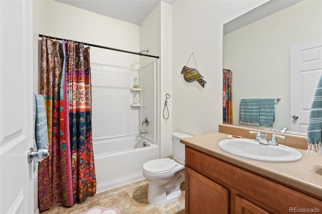 full bath featuring vanity, shower / bath combination with curtain, and toilet