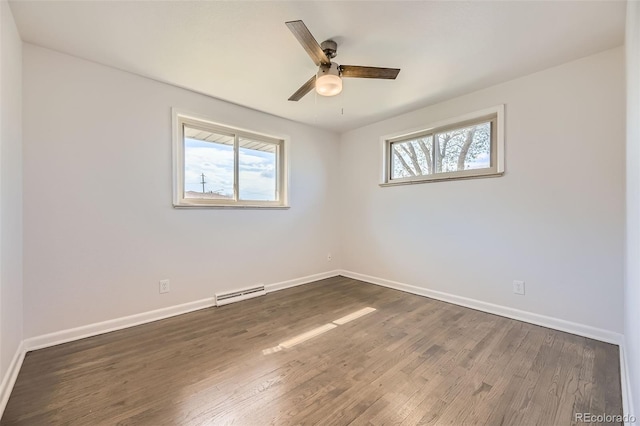 empty room with healthy amount of natural light, baseboards, and a ceiling fan