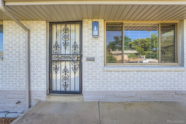 1926 S Yates St, Denver, CO 80219 - entrance to property featuring brick siding