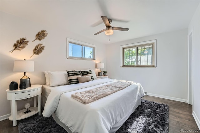 1926 S Yates St, Denver, CO 80219 - bedroom featuring dark wood finished floors and ceiling fan