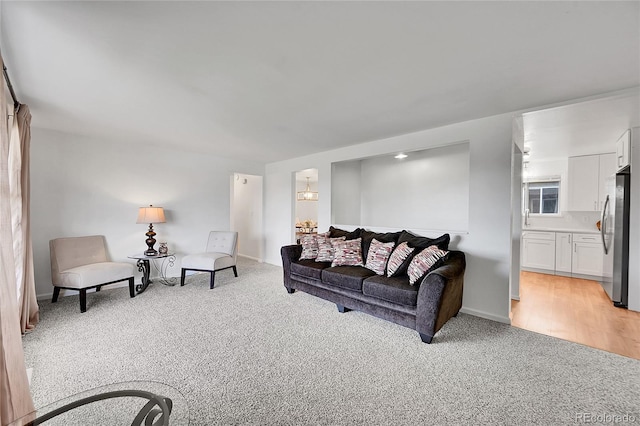 7131 Clay St, Westminster, CO 80030 - living room featuring light carpet and baseboards