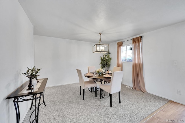 7131 Clay St, Westminster, CO 80030 - dining room with a chandelier and baseboards