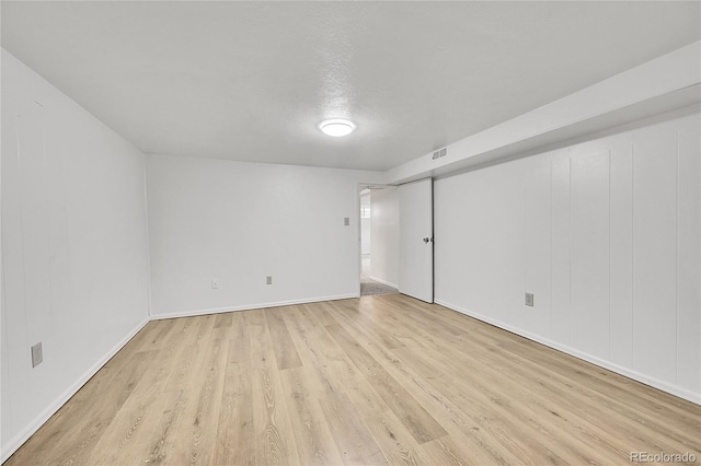 empty room featuring light hardwood / wood-style floors