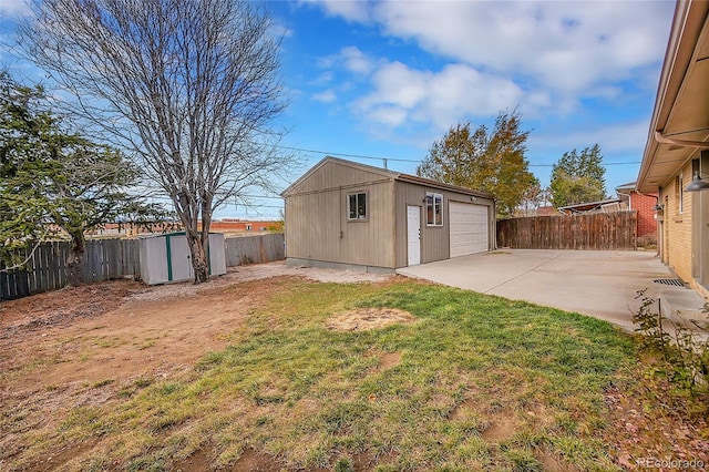 view of yard with a patio and a shed