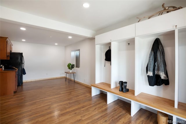 mudroom with recessed lighting, wood finished floors, and baseboards