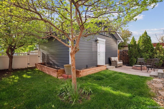 2857 Xanthia Ct, Denver, CO 80238 - view of outdoor structure with a vegetable garden and a fire pit