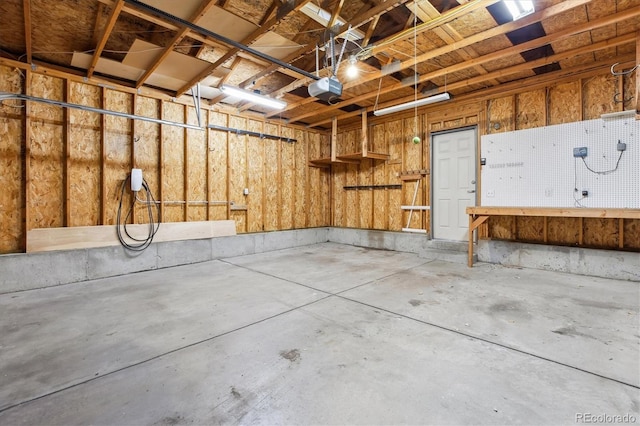 2857 Xanthia Ct, Denver, CO 80238 - garage featuring a workshop area and a garage door opener