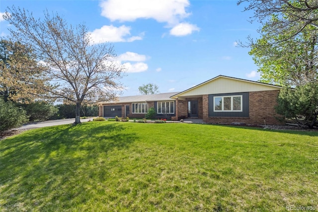 1198 Crestmoor Dr, Boulder, CO 80303 - ranch-style home featuring a garage, driveway, brick siding, and a front lawn