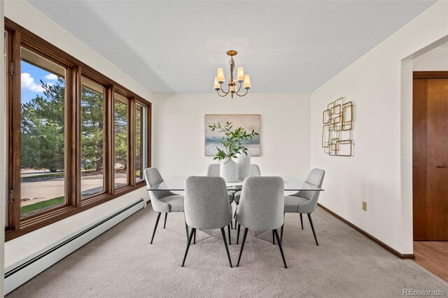 1198 Crestmoor Dr, Boulder, CO 80303 - dining area featuring a baseboard radiator, a chandelier, and light carpet