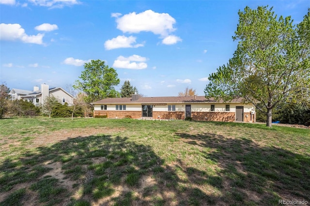 1198 Crestmoor Dr, Boulder, CO 80303 - back of house with a lawn