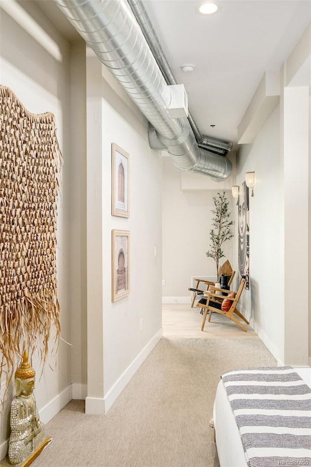 3198 Blake St Unit 402, Denver, CO 80205 - finished below grade area with carpet flooring and recessed lighting