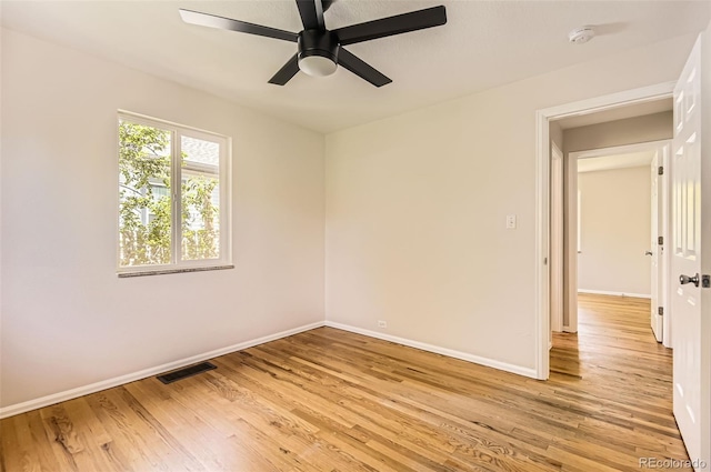4111 S Delaware St, Englewood, CO 80110 - unfurnished room with light wood-type flooring, a smoke detector, and ceiling fan