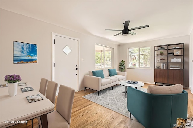 4111 S Delaware St, Englewood, CO 80110 - living area featuring ceiling fan and light wood-style flooring