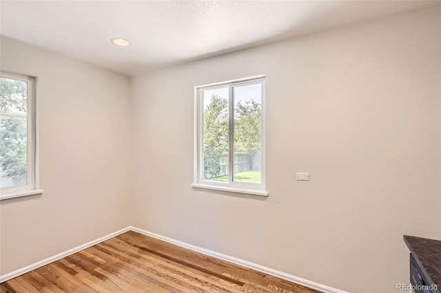4111 S Delaware St, Englewood, CO 80110 - spare room with healthy amount of natural light and light wood-type flooring