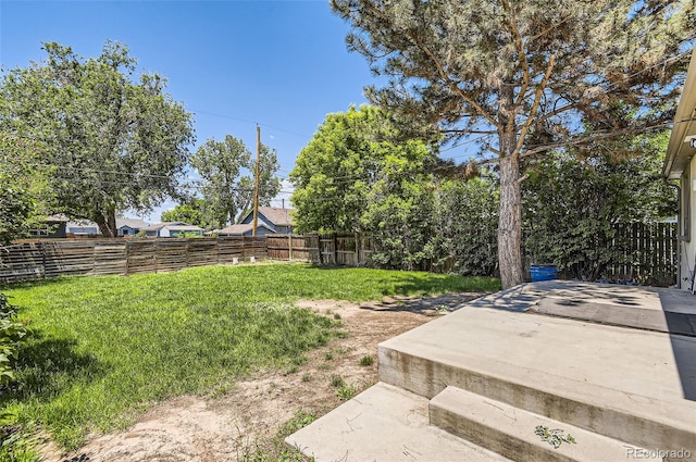 4111 S Delaware St, Englewood, CO 80110 - fenced backyard featuring a patio area