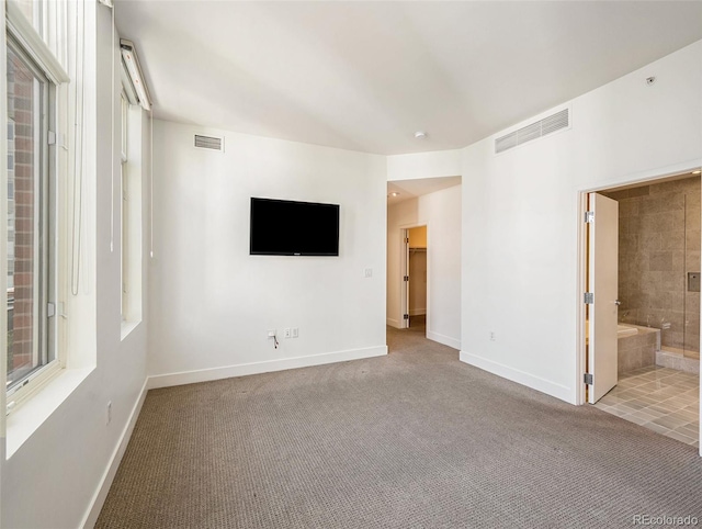 empty room with light colored carpet